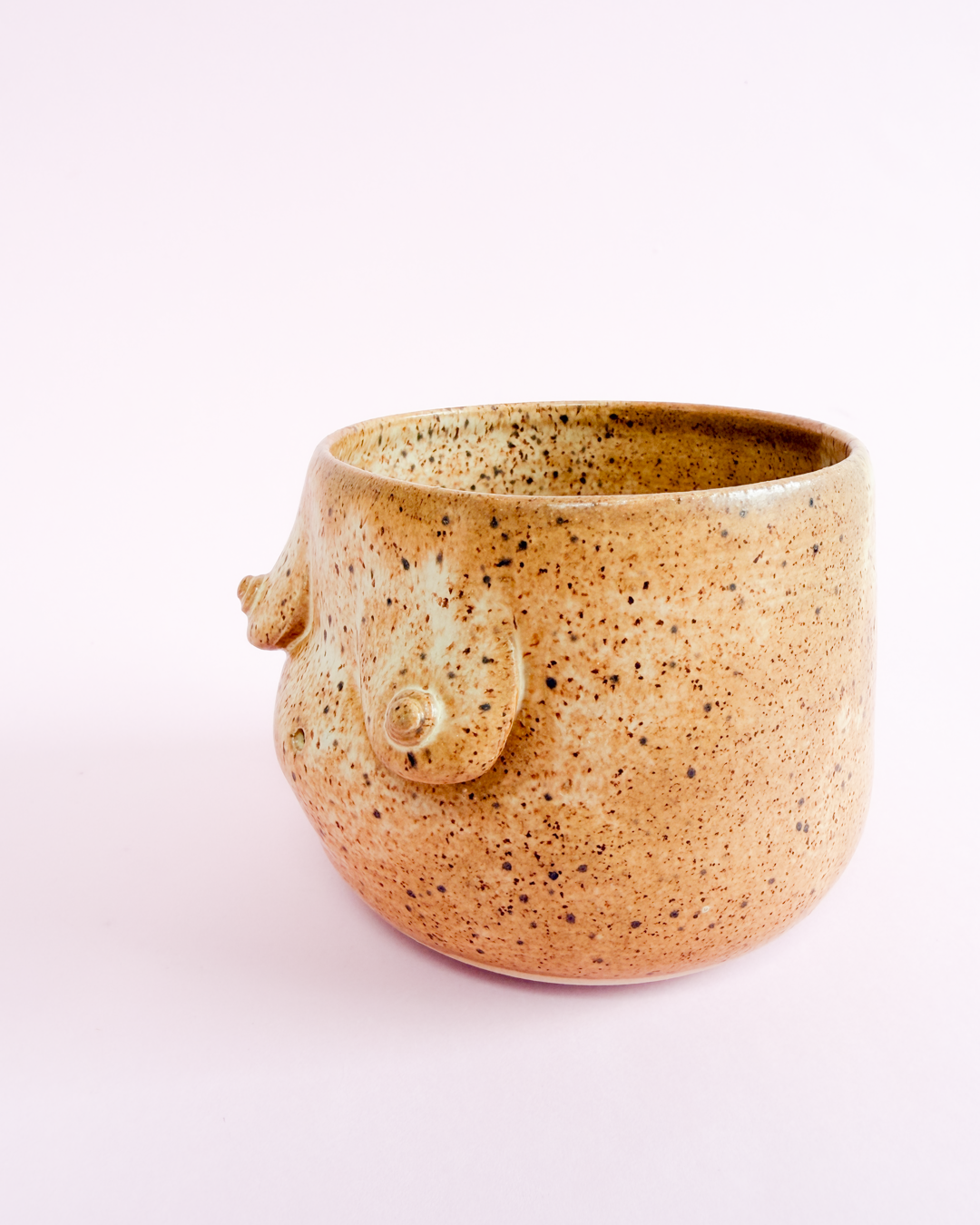 Brystkop i beige glasur