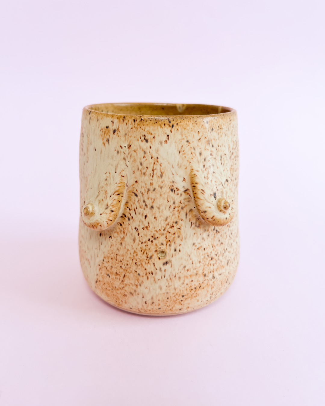 Brystkop i beige glasur